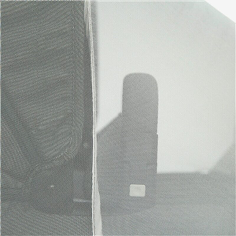 Joolz Aer mosquito net — fitted on carrycot, side view