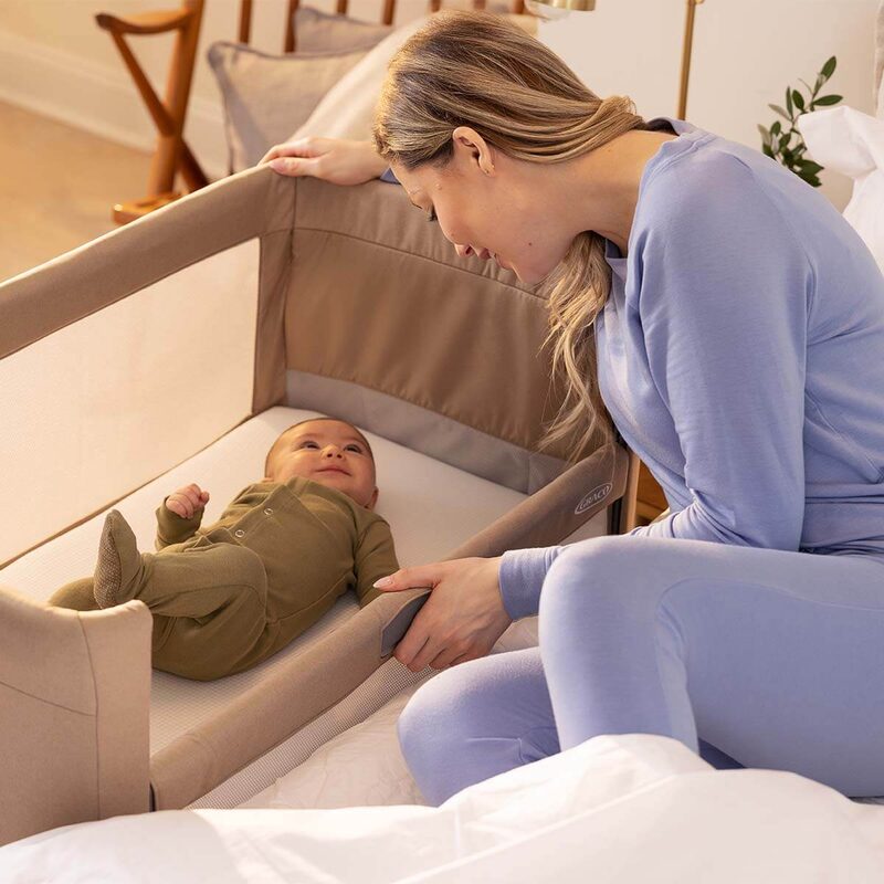 Graco Sweet2Sleep one-hand drop-down side panel