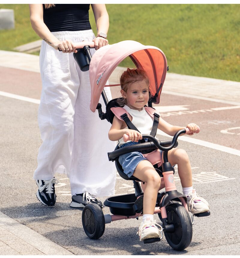 QPlay Elite Platinum — walk with child, parent steering tricycle with canopy
